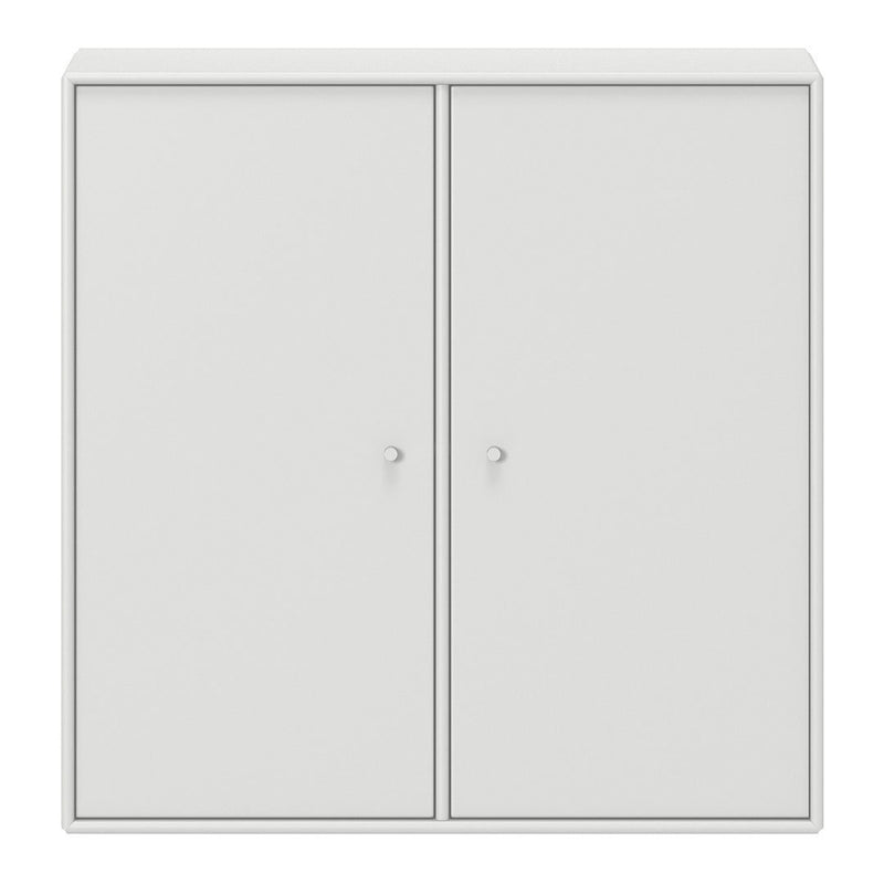 White cabinet with a sleek, minimal design featuring smooth surfaces and round knobs. Ideal for modern decor.