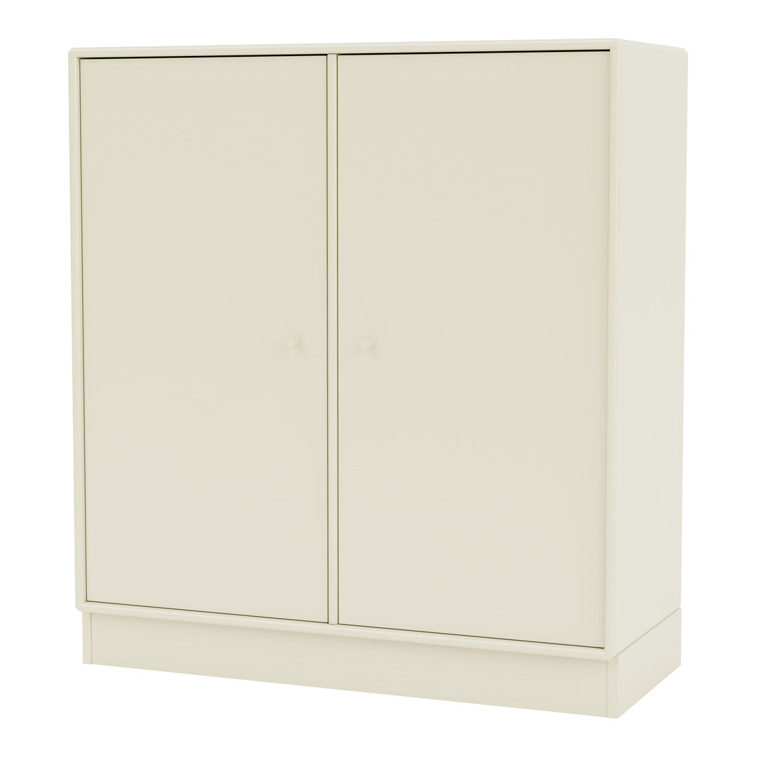Cream-colored modern cupboard with a smooth, matte finish and minimalist design. Perfect for any contemporary space.