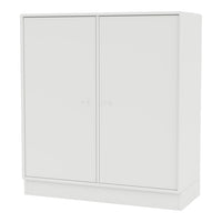 White modern cabinet with a smooth finish and minimalist design, featuring twin doors and simple knobs.