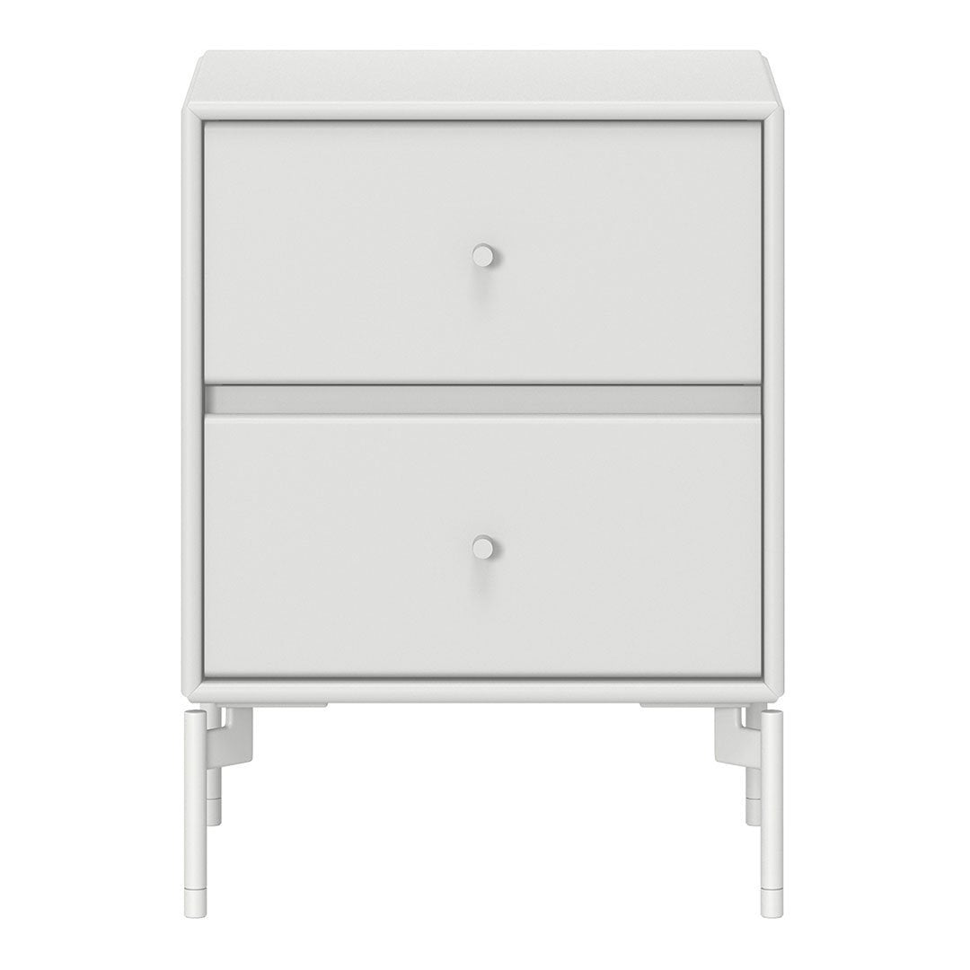 White bedside table with two drawers featuring a minimalistic design and smooth finish, complemented by simple silver knobs.