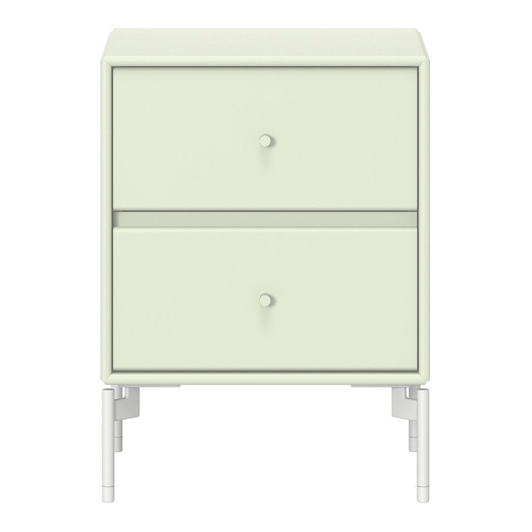 Light green nightstand with two drawers and white legs, featuring a sleek, modern design.