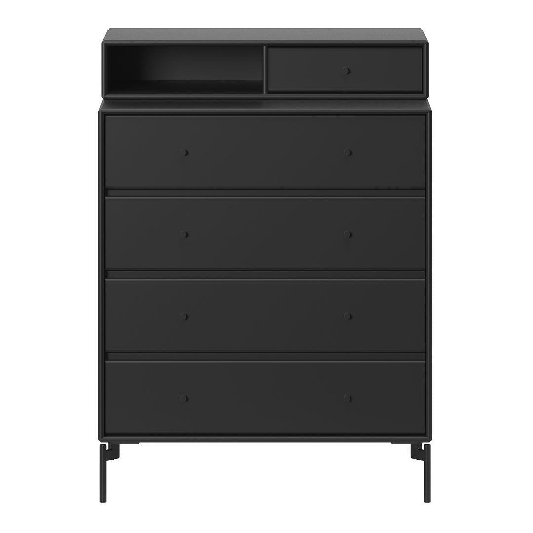 Sleek black dresser with a minimalist design, featuring smooth surfaces and no visible patterns. Perfect for modern decor.