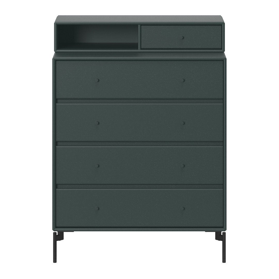 Dark green dresser with a sleek matte finish and minimalist design, featuring a mix of drawer sizes and black legs.