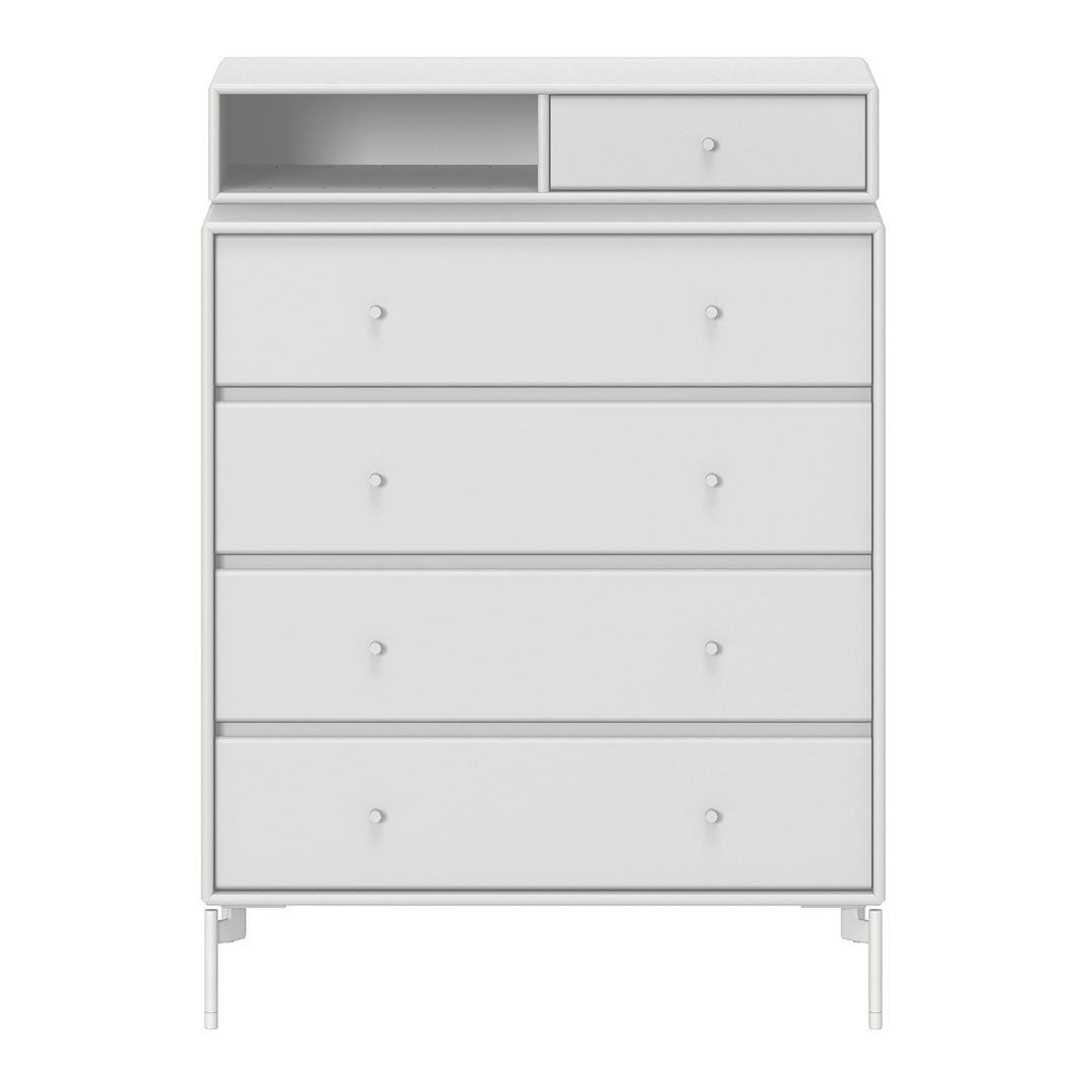 White chest of drawers with smooth surfaces and minimalistic design, featuring five drawers and a top open shelf.