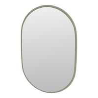 Oval mirror with a sleek, soft green frame, featuring a minimalist design and a smooth reflective surface.