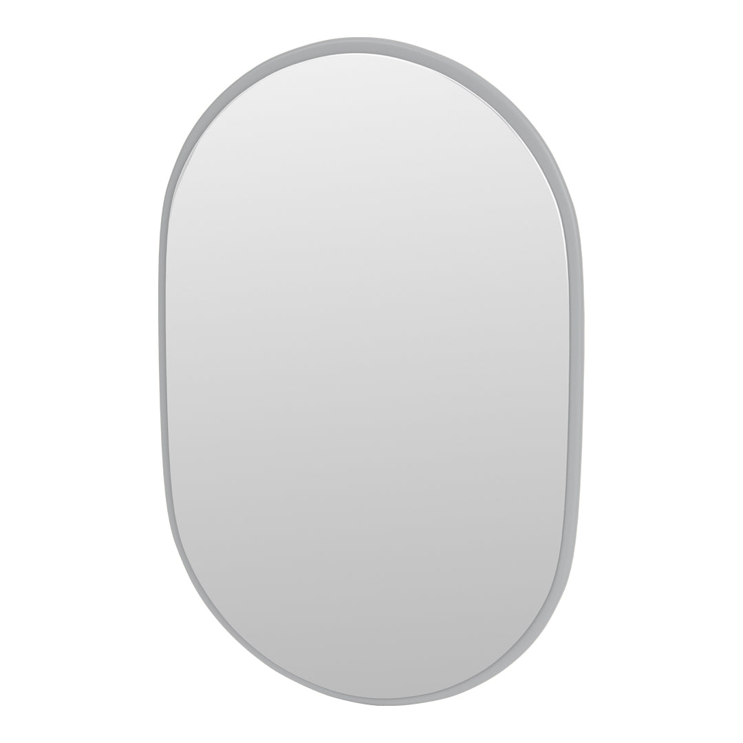 Oval mirror with a minimalist gray frame, featuring a smooth, reflective surface. Perfect for modern decor.
