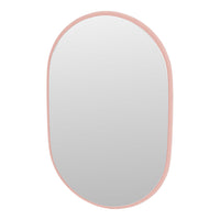 Oval mirror with a soft pink frame and sleek, minimalist design. Ideal for modern decor.