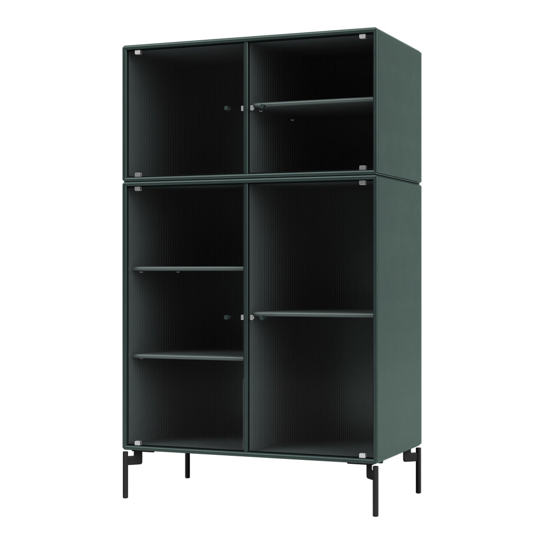 Dark green cabinet with vertical ribbed patterns and sleek black legs, perfect for modern decor.