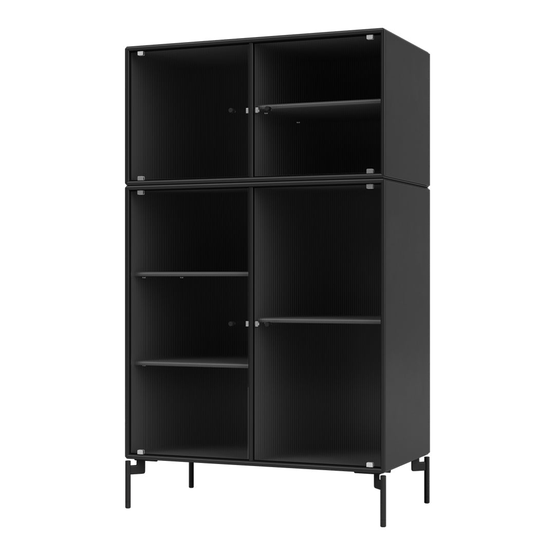 Black bookshelf with a sleek ribbed pattern and minimalist design, featuring multiple compartments and metal legs.