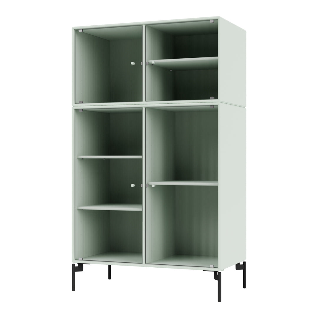 Light green cabinet with vertical ribbed pattern and black metal legs, offering a modern, sleek design.
