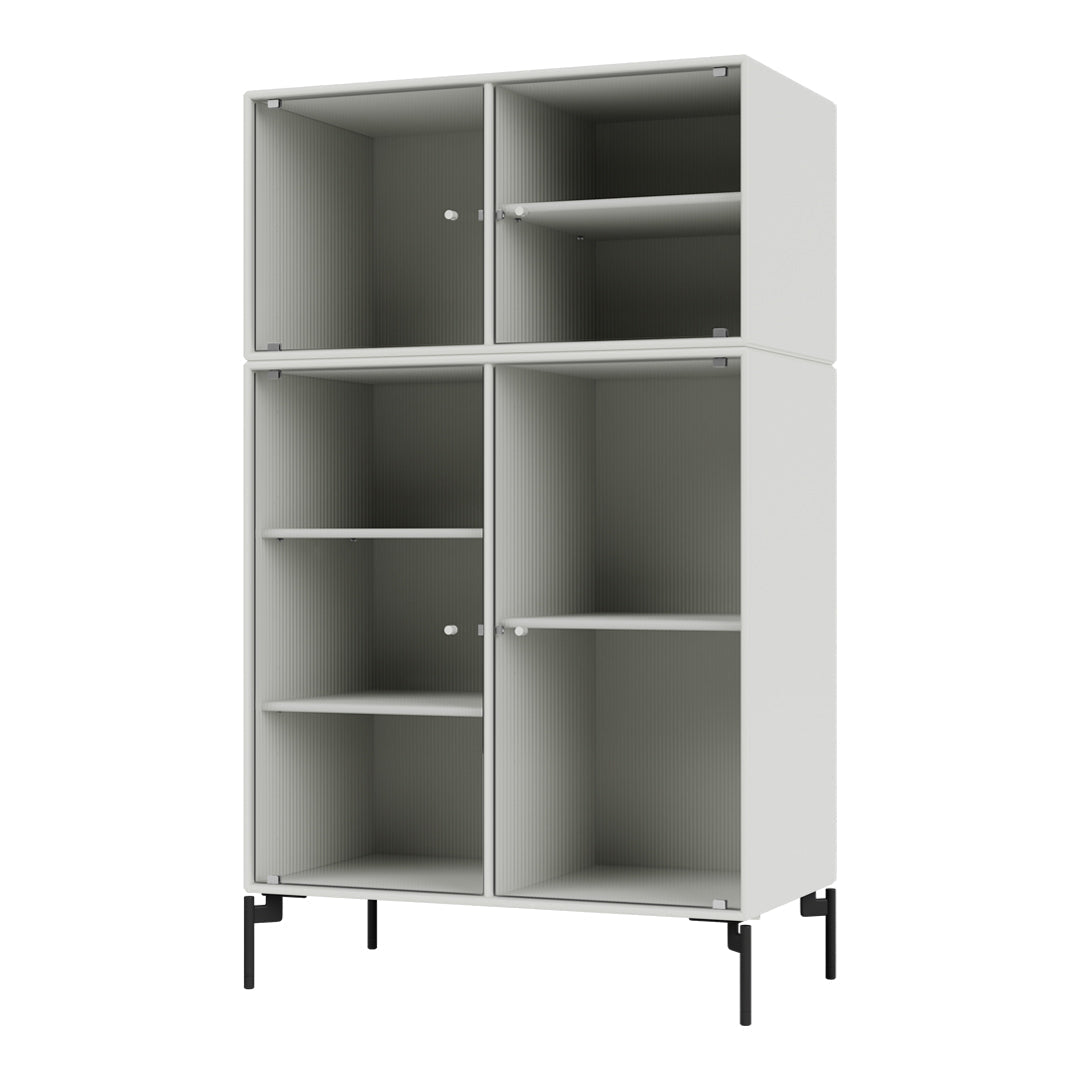 White cabinet with a ribbed texture, featuring a minimalistic design and black metal legs. Ideal for modern decor.