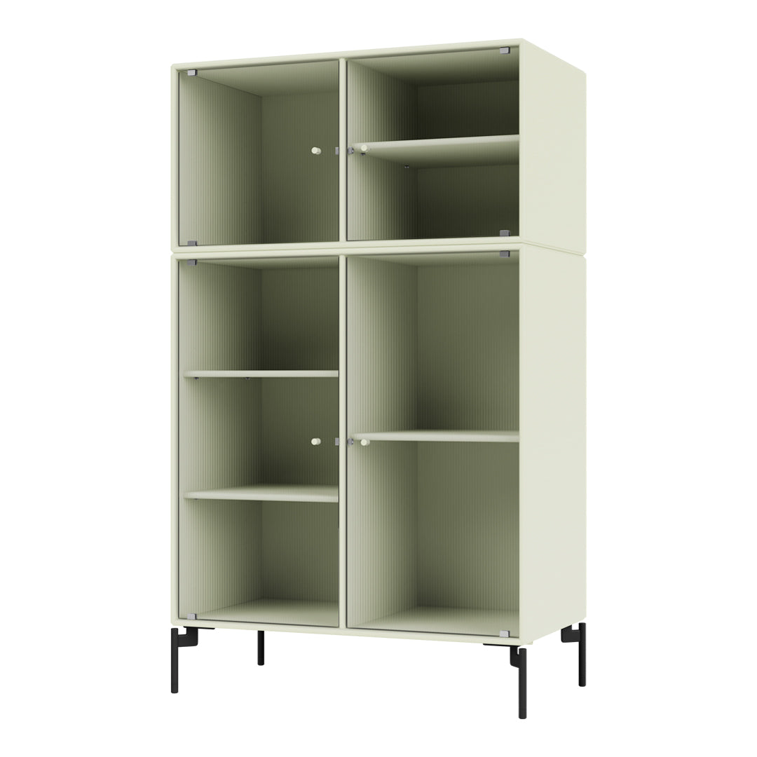 Light green modular cabinet with vertical ribbed texture and sleek black metal legs. Perfect for modern decor.