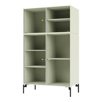 Light green modular cabinet with vertical ribbed texture and sleek black metal legs. Perfect for modern decor.