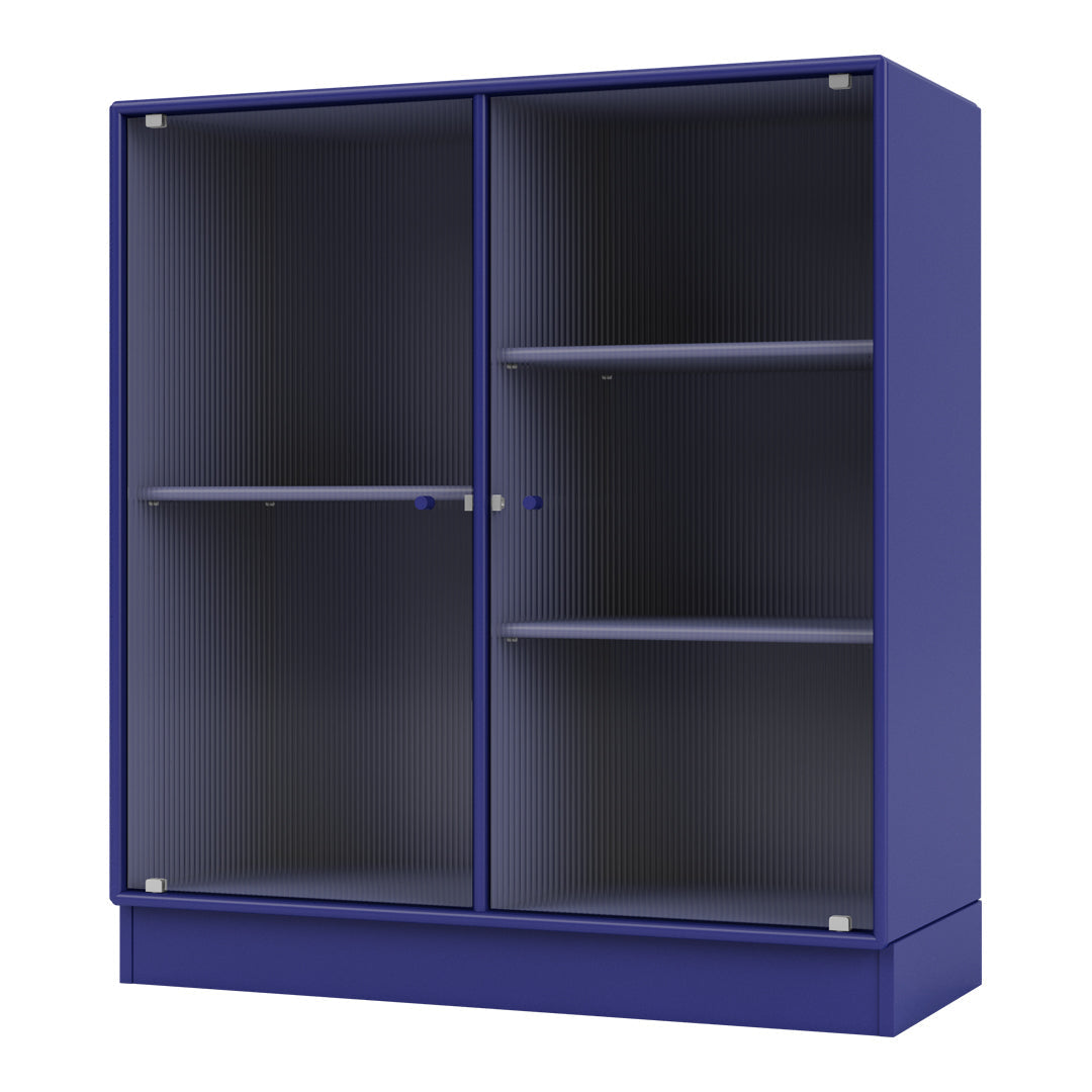 Vibrant purple storage cabinet with ribbed pattern and transparent glass doors, featuring spacious shelves inside.