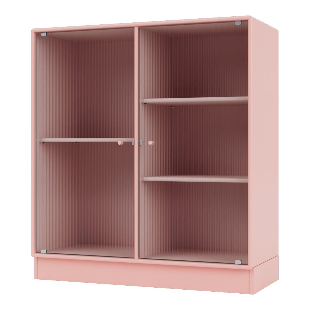 Pink ribbed cabinet with a sleek design and spacious interior shelves. Perfect for modern home decor.