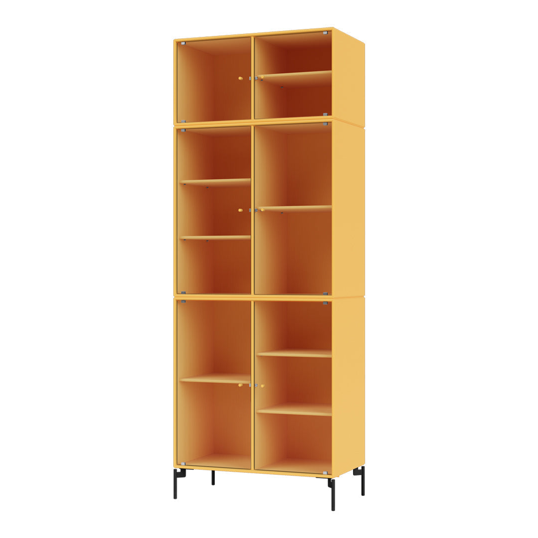 Tall, vibrant yellow bookshelf with open storage compartments and a sleek black metal base.