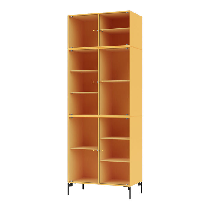 Tall, vibrant yellow bookshelf with open storage compartments and a sleek black metal base.