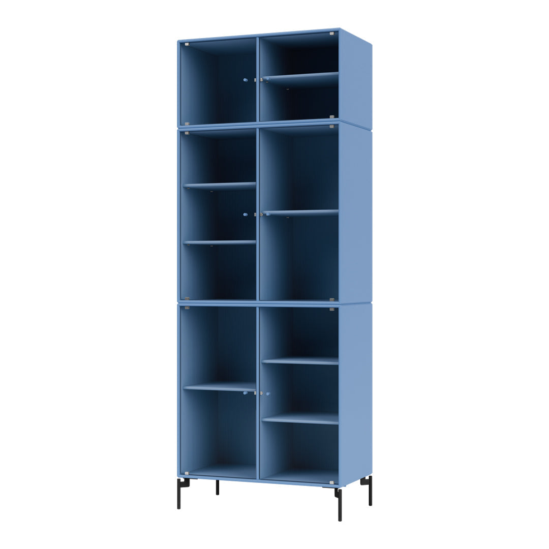 Blue modular shelf unit with a sleek, minimal design and open sections for storage. Perfect for modern decor.