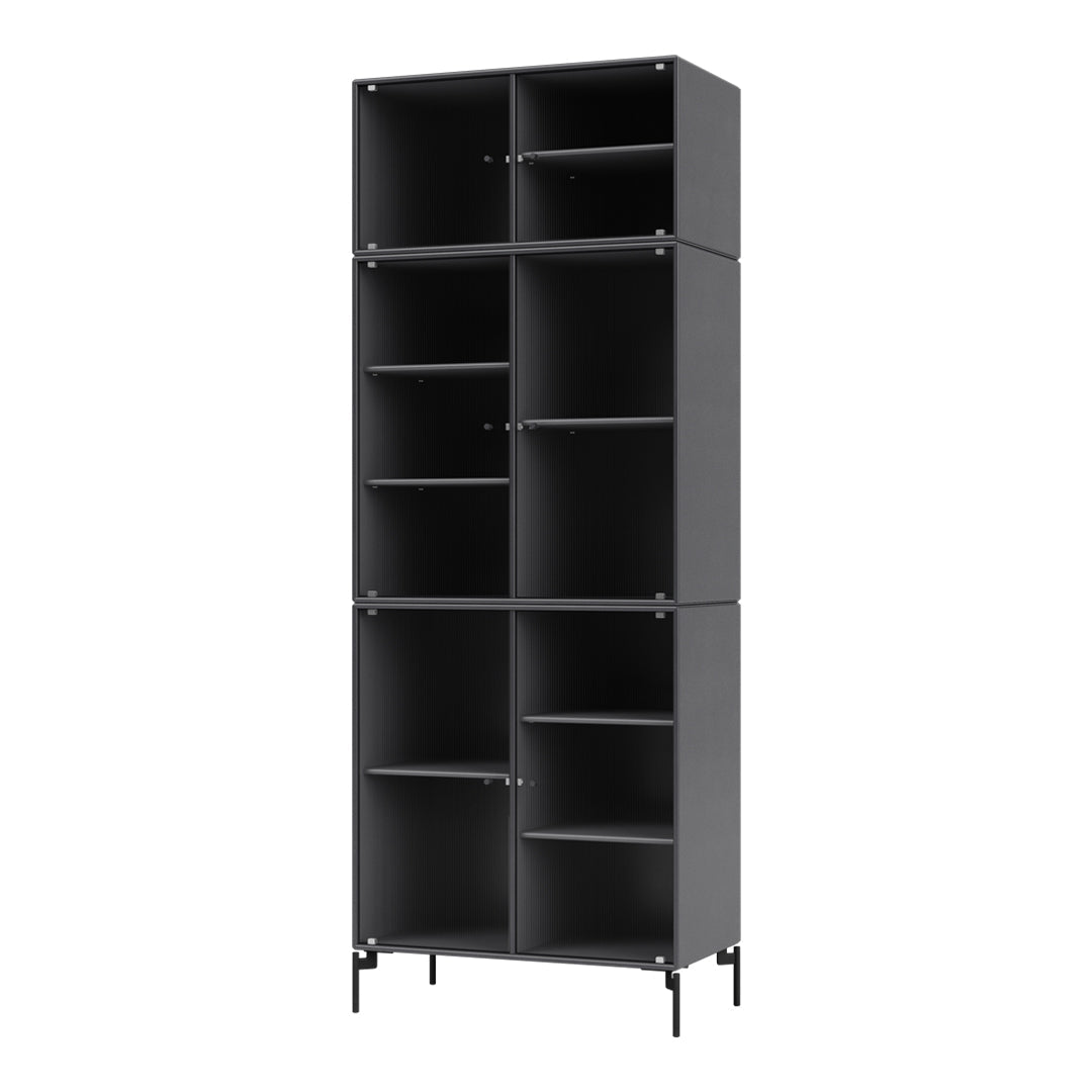 Black modern shelving unit with a sleek, minimalistic design and vertical ribbed pattern on the sides.