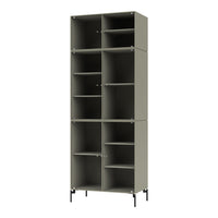 Tall, muted green shelving unit with textured ribbed pattern and sleek black legs, offering a modern aesthetic.