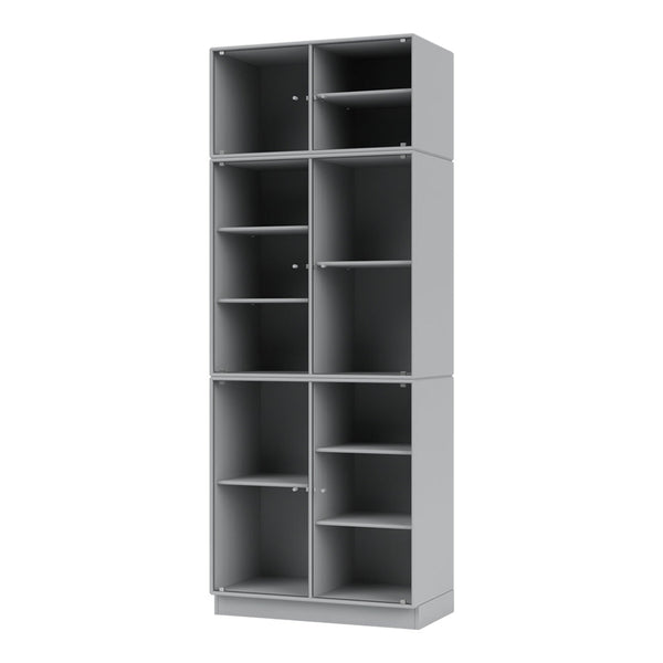 Gray modular bookshelf with a smooth finish and multiple open compartments. Ideal for modern interiors and organization.
