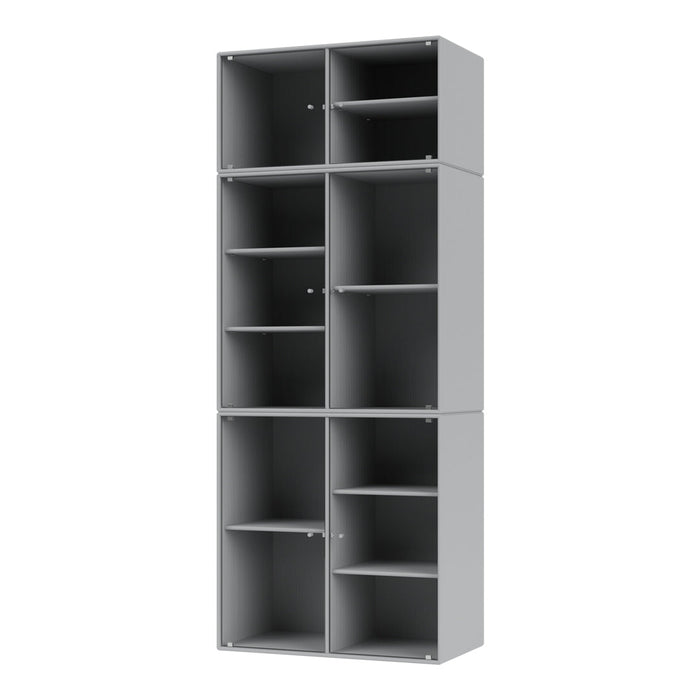Gray four-tier bookshelf with decorative grooves and multiple open compartments for stylish storage solutions.