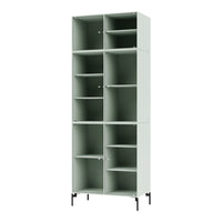 Tall, mint green shelving unit with a sleek design and open compartments on black metal legs.