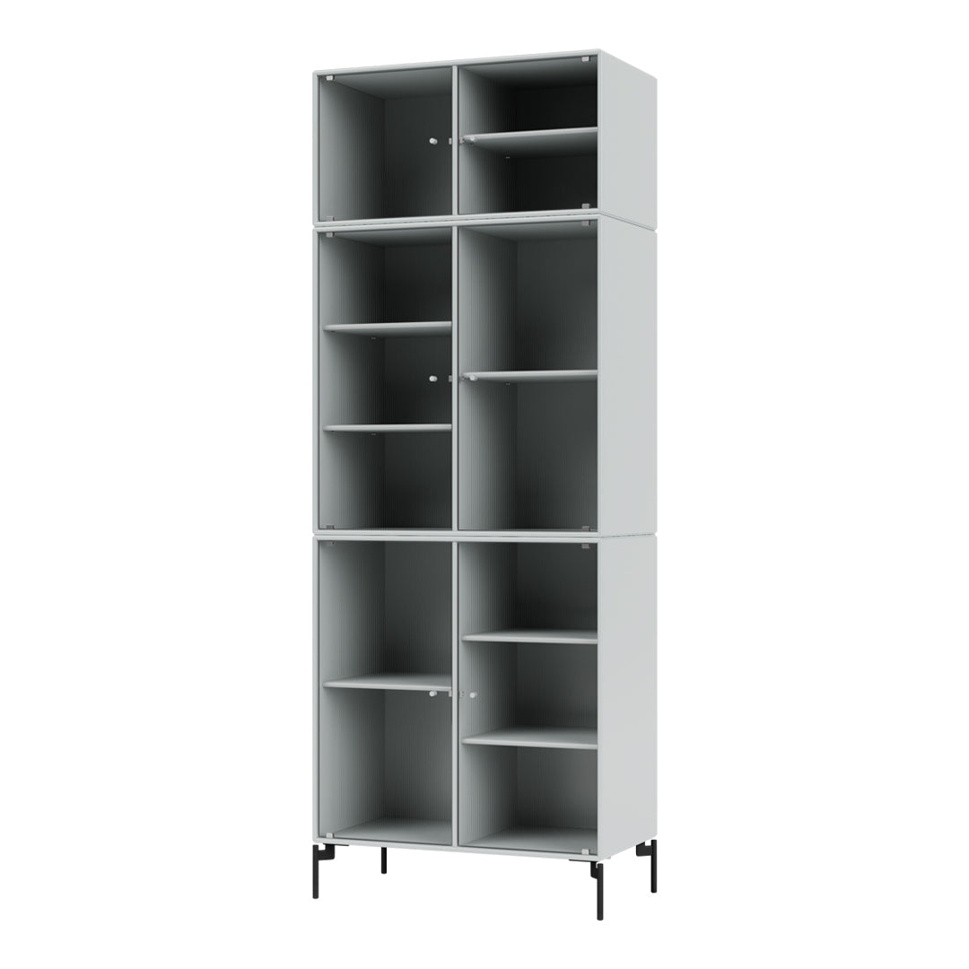 Tall gray bookshelf with six open compartments and minimalist design, featuring sleek lines and modern structure.