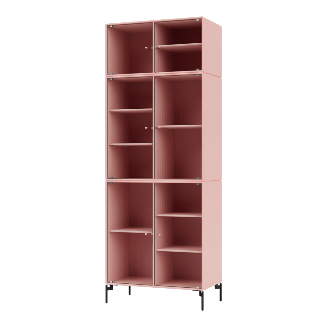 Tall pink shelving unit with a sleek design and open cubby patterns for modern storage solutions.