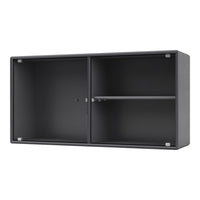 Black ribbed cabinet with a sleek finish and silver accents, showcasing modern, minimalist design.