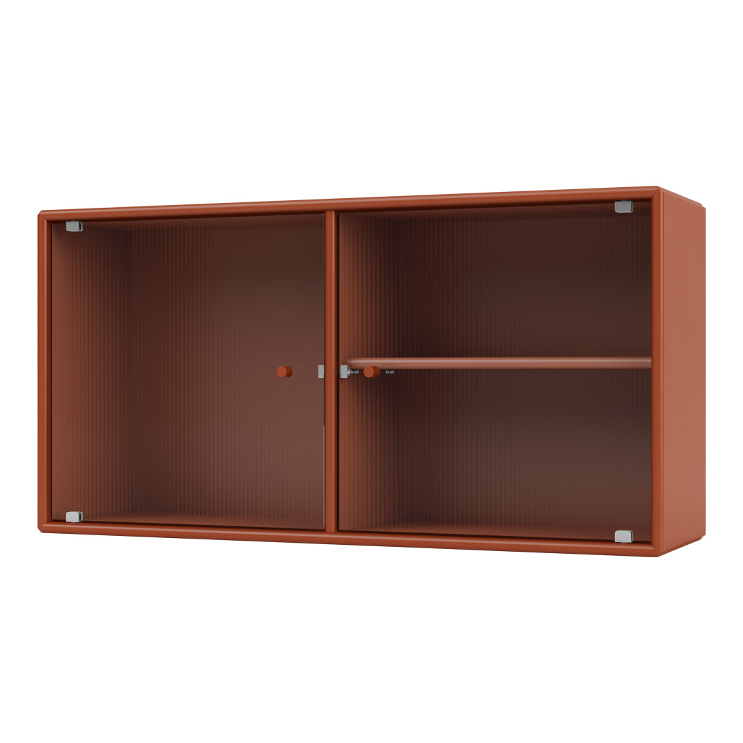 Modern terracotta cabinet with ribbed texture and contrasting silver hardware. Ideal for contemporary decor.