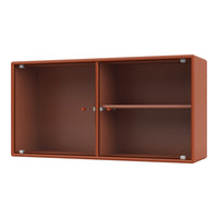 Modern terracotta cabinet with ribbed texture and contrasting silver hardware. Ideal for contemporary decor.