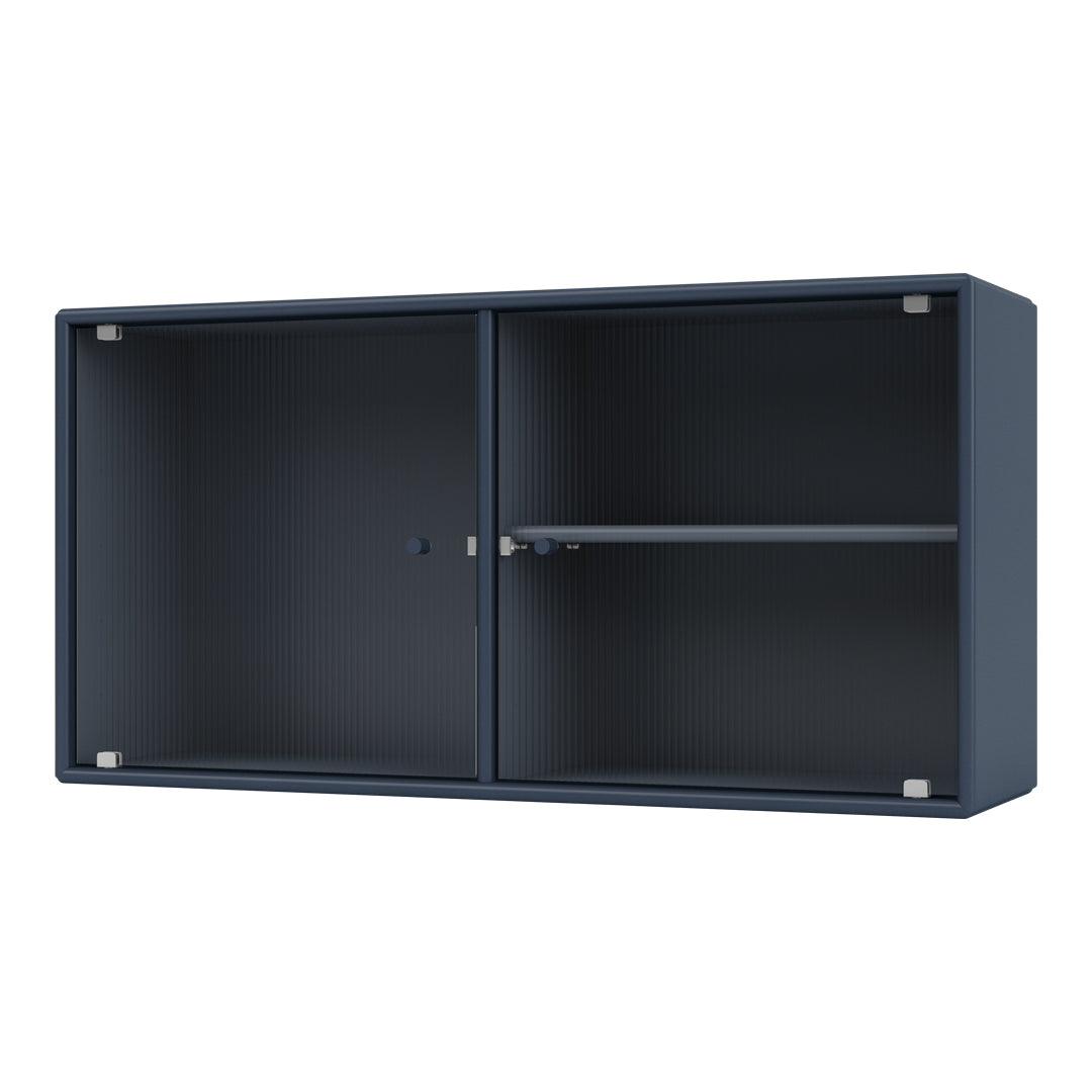 Navy blue ribbed cabinet with a sleek finish and metallic accents, perfect for modern interiors.