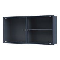 Navy blue ribbed cabinet with a sleek finish and metallic accents, perfect for modern interiors.