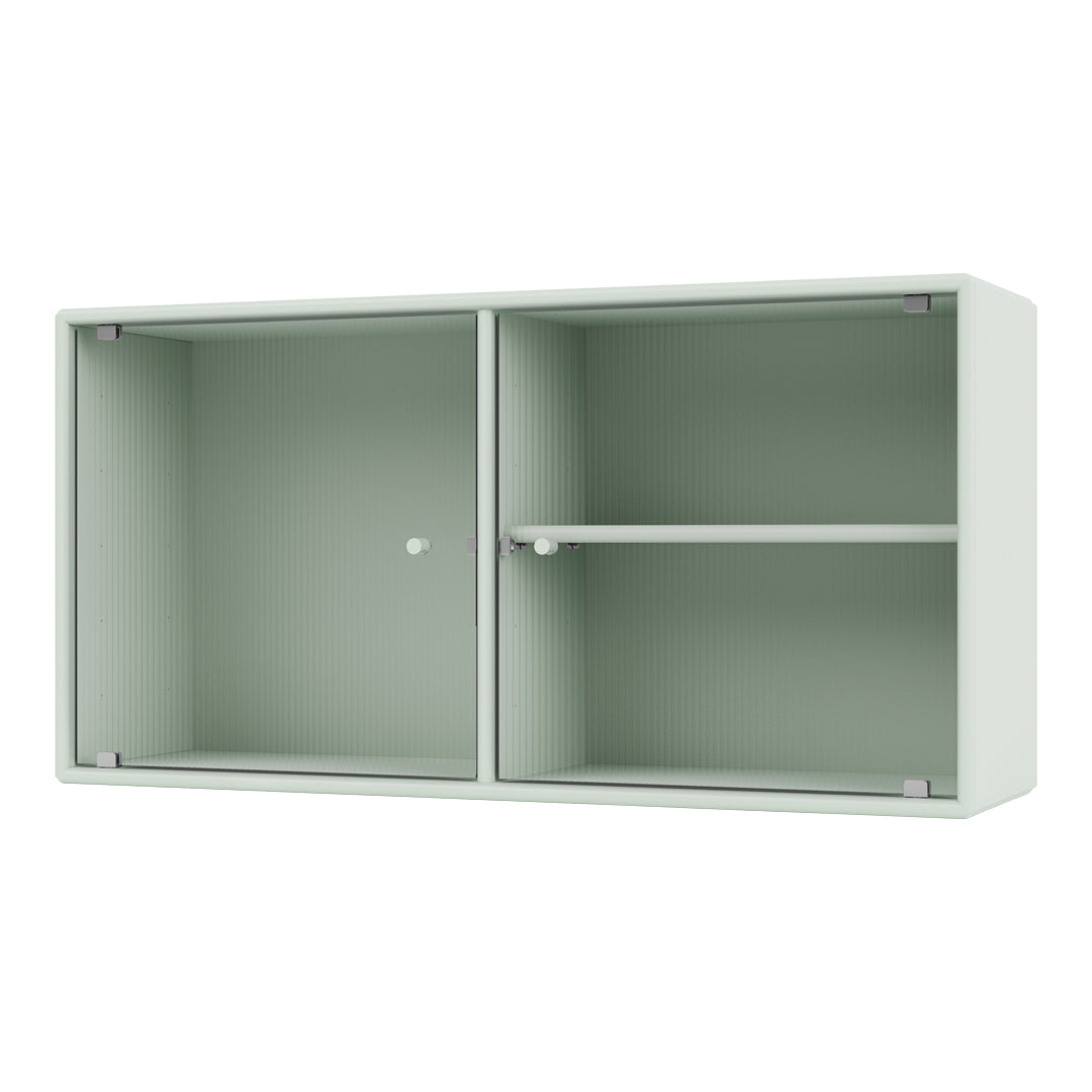 Light green cabinet with vertical ribbed texture and minimalistic design, featuring two compartments and a middle shelf.
