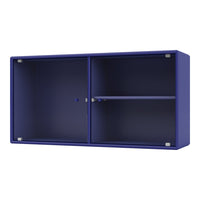 Vibrant royal blue cabinet with ribbed texture and sleek silver accents. Perfect for modern home decor.