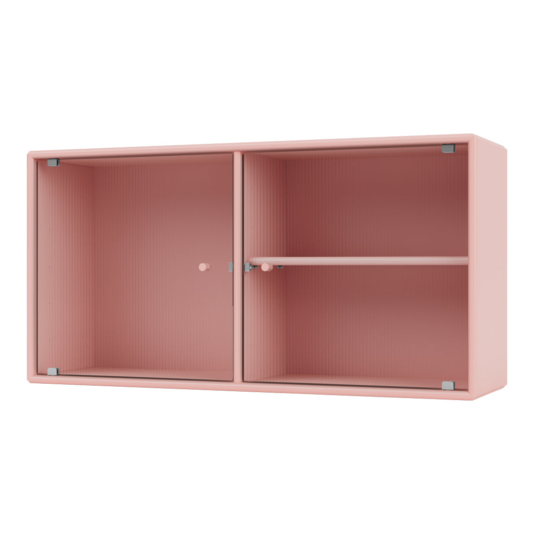 Pink ribbed cabinet with clean lines and a minimalist design, featuring two compartments and a central shelf.