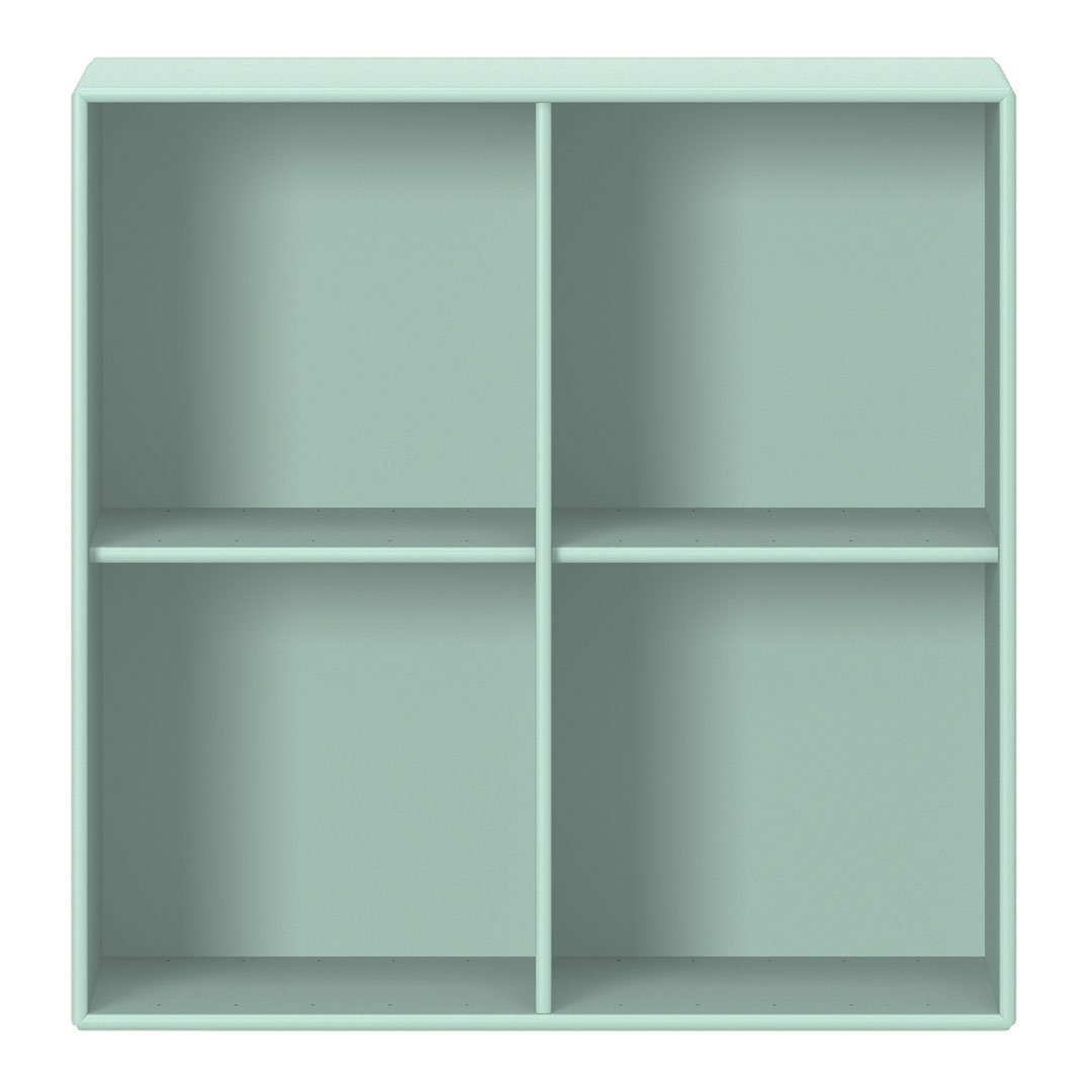 Mint green cube storage shelf with four compartments, featuring a sleek, modern design. Ideal for decorative organization.