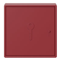 Red metal key storage box with a smooth, matte finish and a keyhole design, highlighting deep burgundy tones.