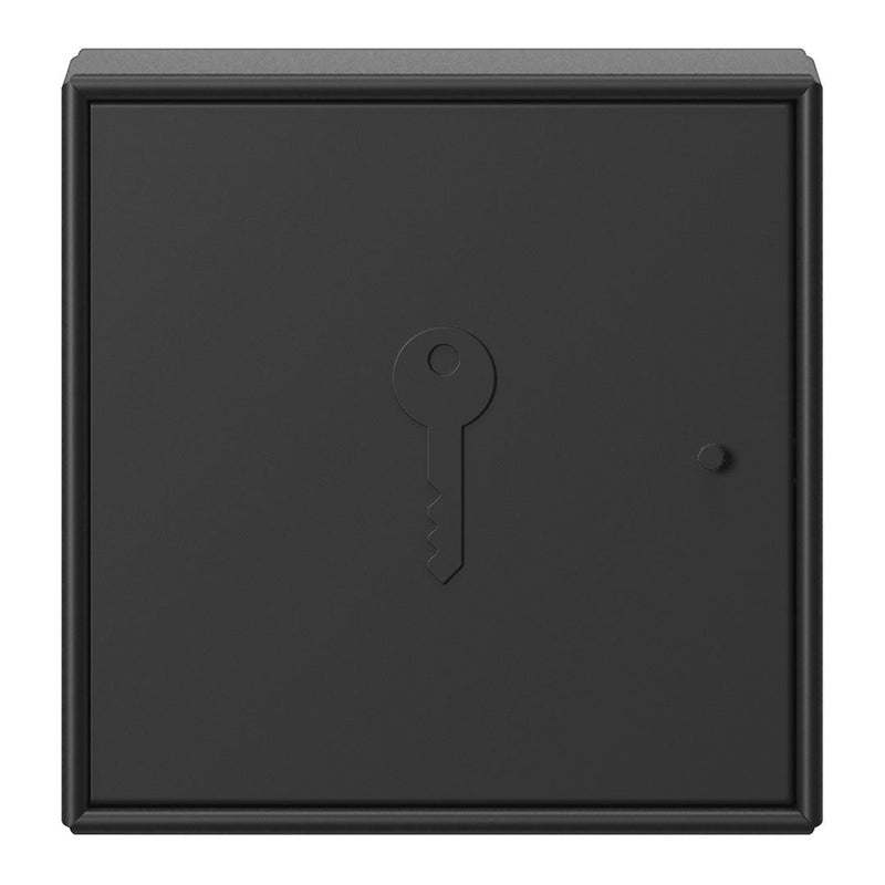 Black key holder with a minimalist design and textured surface, featuring a keyhole motif. Perfect for modern decor.