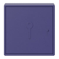 Solid purple key storage box with a subtle textured finish and embossed key design. Perfect for home organization.