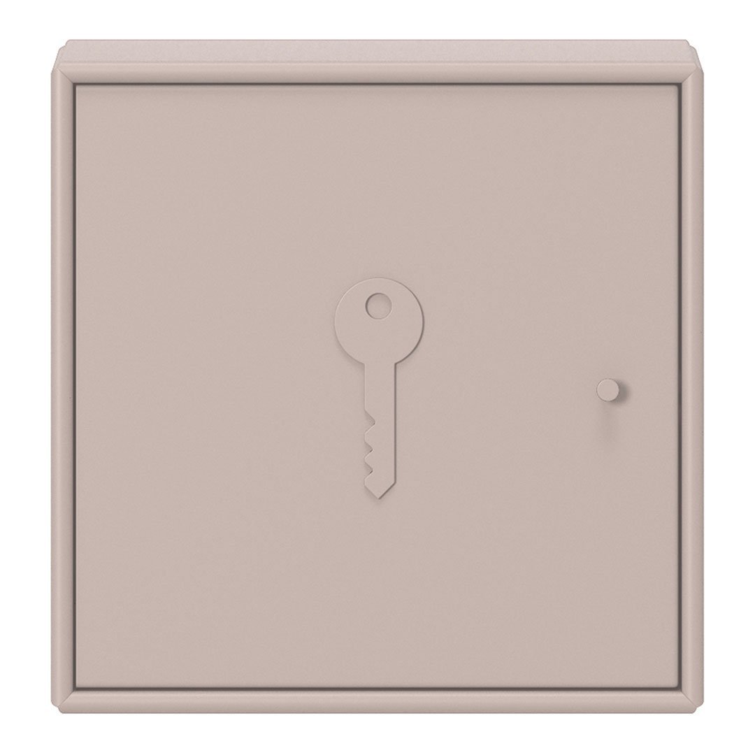 Soft beige wall-mounted key holder with a minimalist design and key-shaped cutout detail.