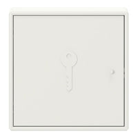White key storage box with a minimalist design featuring a subtle key motif and smooth surface texture.