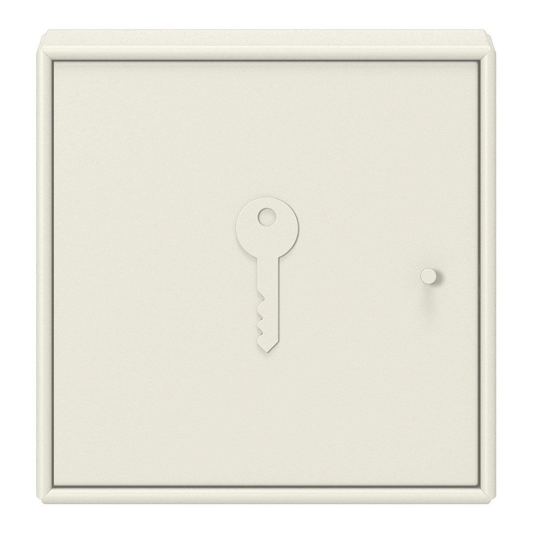Beige key storage box with a smooth, matte finish and a minimalist keyhole design.
