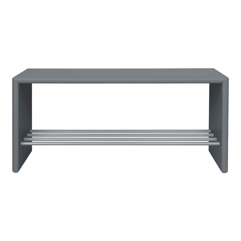 Gray modern bench with sleek design and silver metal accents. Minimalist style perfect for any decor.