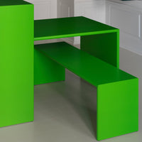 Bright green modern table and bench set with a sleek, minimalist design, perfect for contemporary spaces.