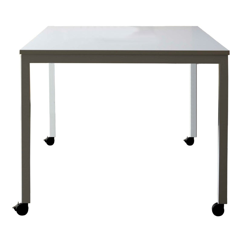 White tabletop with sleek gray legs and black wheels, featuring a minimalist design for modern spaces.