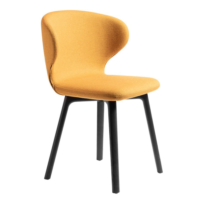 Yellow upholstered chair with a smooth, curvy design and sleek black legs. Perfect for modern decor.