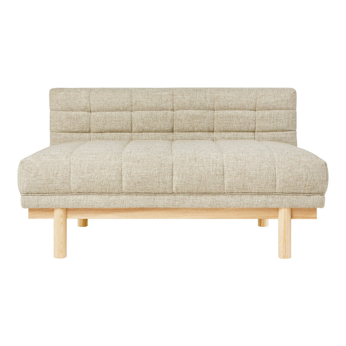 Beige upholstered sofa with tufted pattern and light wood legs, perfect for modern or minimalist decor.