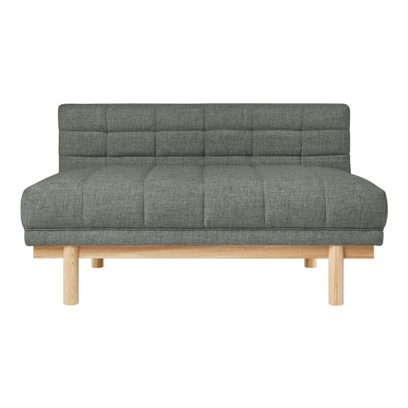 Gray tufted fabric sofa with a minimalist design and light wood legs, perfect for modern interiors.